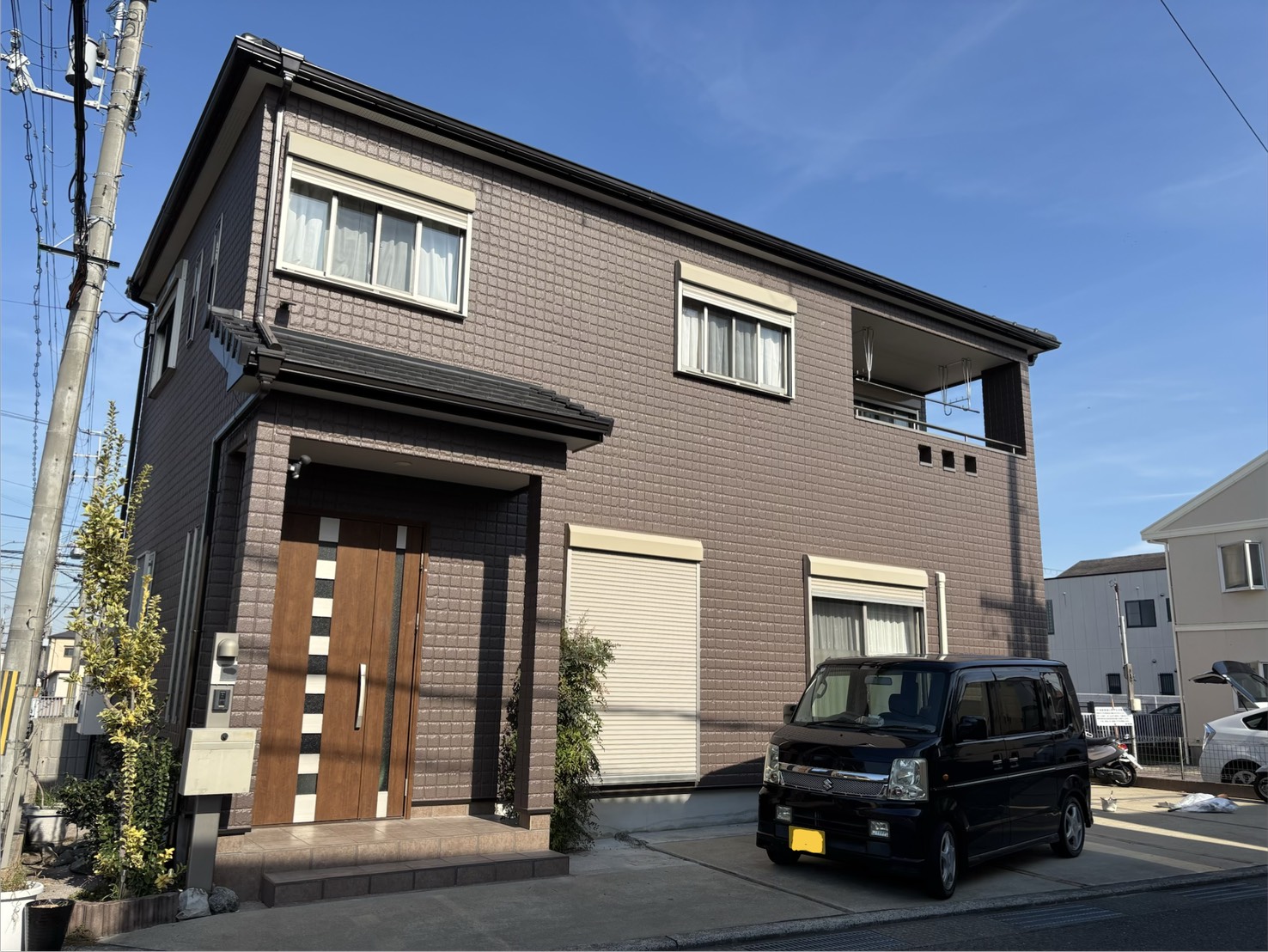 和泉市でセラミック塗装のされたパワーボード外壁を塗り替え